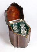 A tantalus with three decanters and three George III silver crescent shaped wine labels, Nathaniel