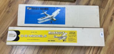 Two large wooden aircraft kits; a D.B. models Mannock and a Pegasus D.H. 82A Tiger Moth, longest box