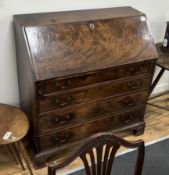 * * A George III mahogany bureau, width 100cm, depth 51cm, height 108cm Please note this lot