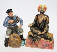 Two Doulton figures, Lobster Man and Mendicant