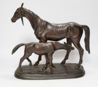 A modern bronze mare and foal, 32cm long