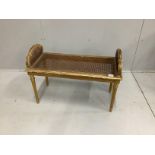A Victorian carved giltwood and composition caned window seat, width 85cm, depth 38cm, height 60cm