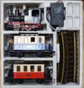 An LGB by Lehman 45mm passenger train set, comprising an 0-4-0T locomotive, two coaches, track and