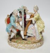 An early 20th century Meissen figure group of musicians, stamped D48, 18cm