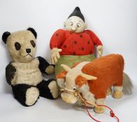 A Katzenjammer Kids 'Misses', felt body and composition face, 36cm high, a Chiltern panda, 1950's,