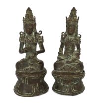 * A pair of bronze seated figures of Bodhisattva, Java, 18th/19th century, each 10cmPlease note