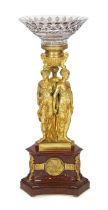 * * After Pierre-Philippe Thomire (1751-1843), a French Empire ormolu and rouge marble centrepiece