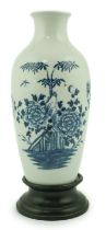 A Chinese blue and white ‘peonies and bamboo’ vase, Jiaqing period, of ovoid form, painted with