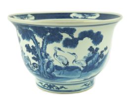 A Chinese blue and white 'deer and cranes' planter, 19th century, painted with deer, cranes, pine