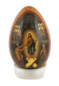 * * A Russian lacquer ‘Old Believers’ Easter egg, c.1860-80, finely painted with the resurrection of