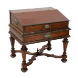 An 18th century Dutch colonial satinwood bureau, the fall enclosing five small drawers over a frieze