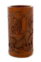 A Chinese bamboo 'river landscape' inscribed brushpot, bitong, 19th century, carved in relief with