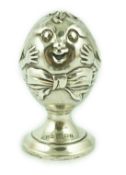 A George V novelty silver pepperette, modelled as Humpty Dumpty, by Levy & Salaman, Birmingham,