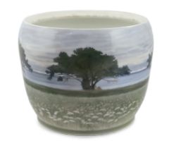 A large Royal Copenhagen jardiniere, 1920s, painted with a continuous seascape, green printed mark