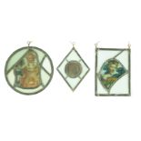 Three stained glass fragment panels, 17th century and later, one depicting a female bust, another of