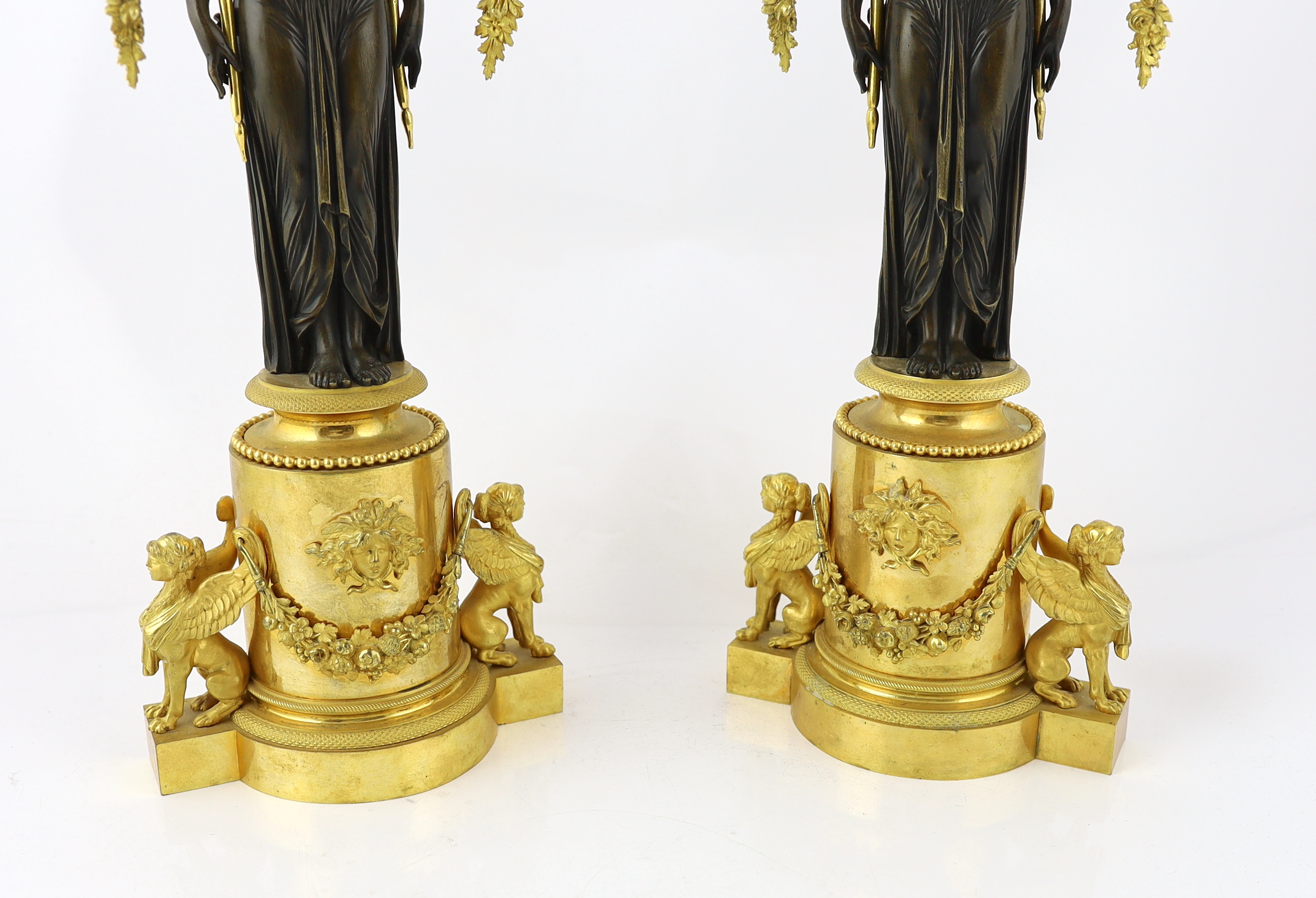 * A pair of late 19th century French Empire style bronze and ormolu three light candelabra, with - Image 6 of 7