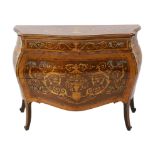 A Continental marquetry inlaid serpentine bombé commode, fitted three long drawers, on scroll
