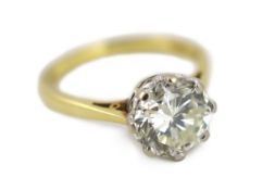 A modern 18ct gold and solitaire diamond set ring, the stone weighing approximately 2.90ct, with