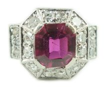 A 1950's Art Deco 18ct gold and platinum, ruby and millegrain set diamond octagonal cluster ring,