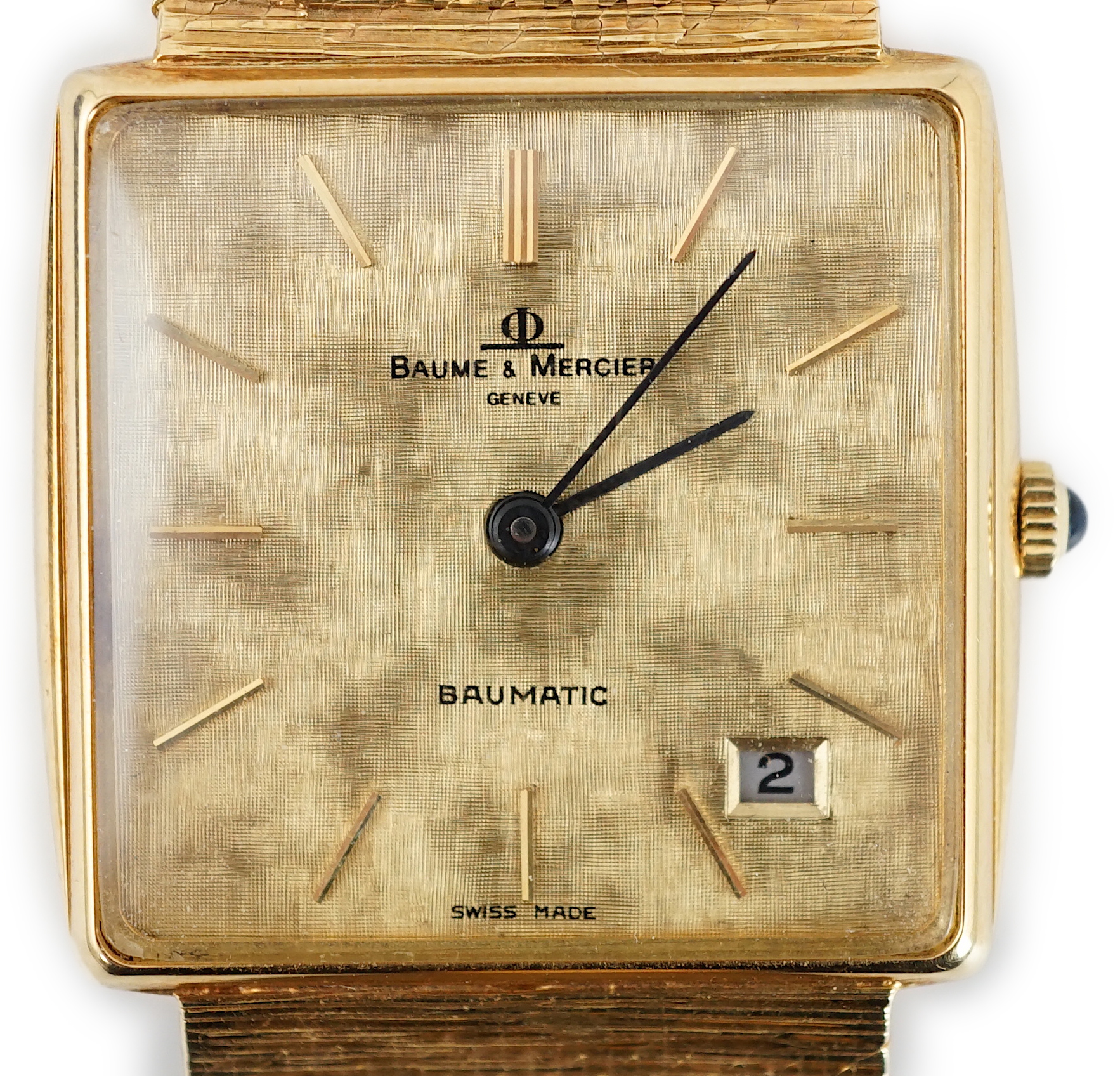 A gentleman's 1980's 18ct gold Baume & Mercier Baumatic dress wrist watch, the textured dial with