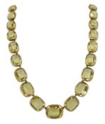 A Victorian gold and graduated cushion cut citrine necklace, set with fifty four stones, largest