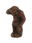 * A Japanese wood netsuke of Son Goku (Sun Wukong) flying on his cloud somersault, early 19th