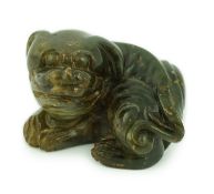 A Chinese Ming green soapstone figure of a recumbent lion-dog, 16th/17th century, 7.5cm long***