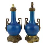 A pair of Chinese or Japanese turquoise-glazed bottle vases with Louis XVI style ormolu lamp mounts,