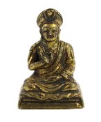 A Chinese miniature cast bronze figure of Teacher (Lama) Changkya Rolpai Dorje, 18th/19th century,