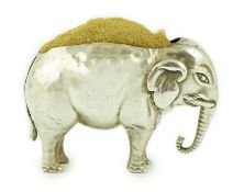 A George V novelty silver pin cushion, modelled as an elephant, Adie & Lovekin Ltd, Birmingham,