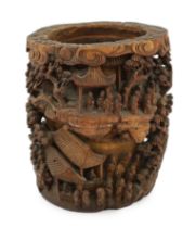 A Chinese bamboo-root ‘scholars’ brushpot, bitong, 19th century, carved in high relief and