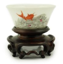 A Chinese enamelled porcelain 'leaping carp' cup, Daoguang mark and possibly of the period,