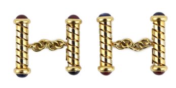 A pair of Italian Bulgari two colour 18ct gold and cabochon ruby and sapphire set baton cufflinks,