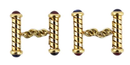 A pair of Italian Bulgari two colour 18ct gold and cabochon ruby and sapphire set baton cufflinks,