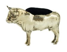 An Edwardian novelty silver pin cushion, modelled as a bull, Cohen & Charles, Birmingham, 1906,