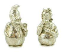 A pair of cast late Victorian novelty silver pepperettes, modelled as Punch and Judy, Edward H.