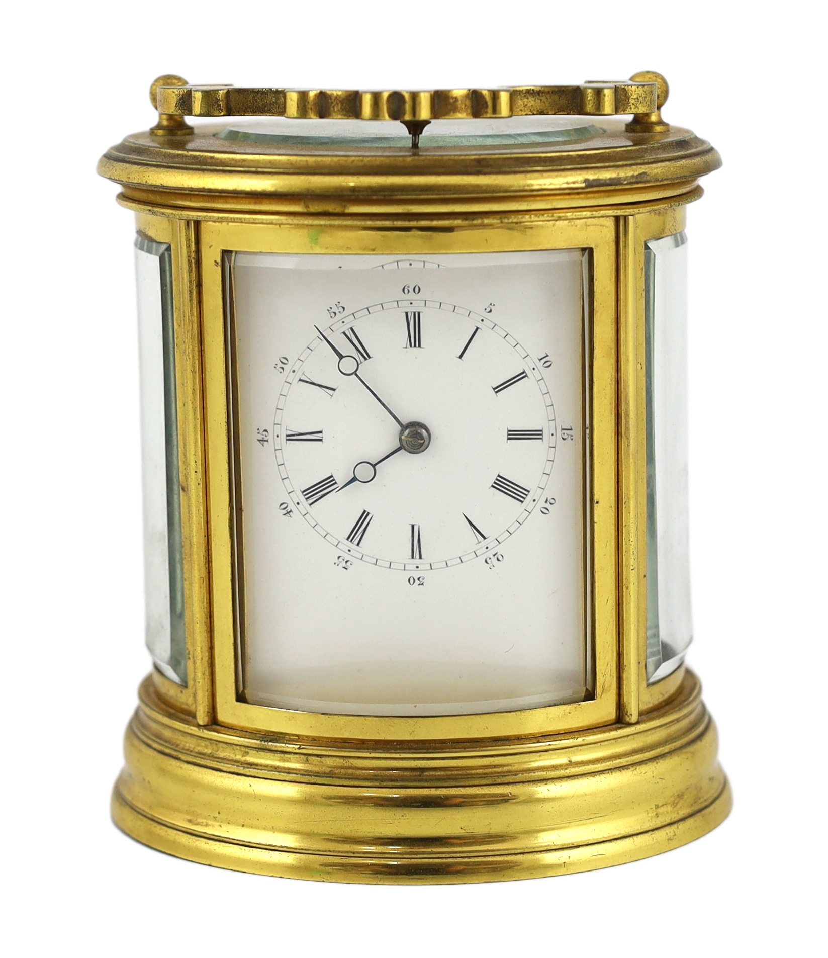 * A late 19th century French brass oval cased eight day hour repeating carriage clock, by Henri