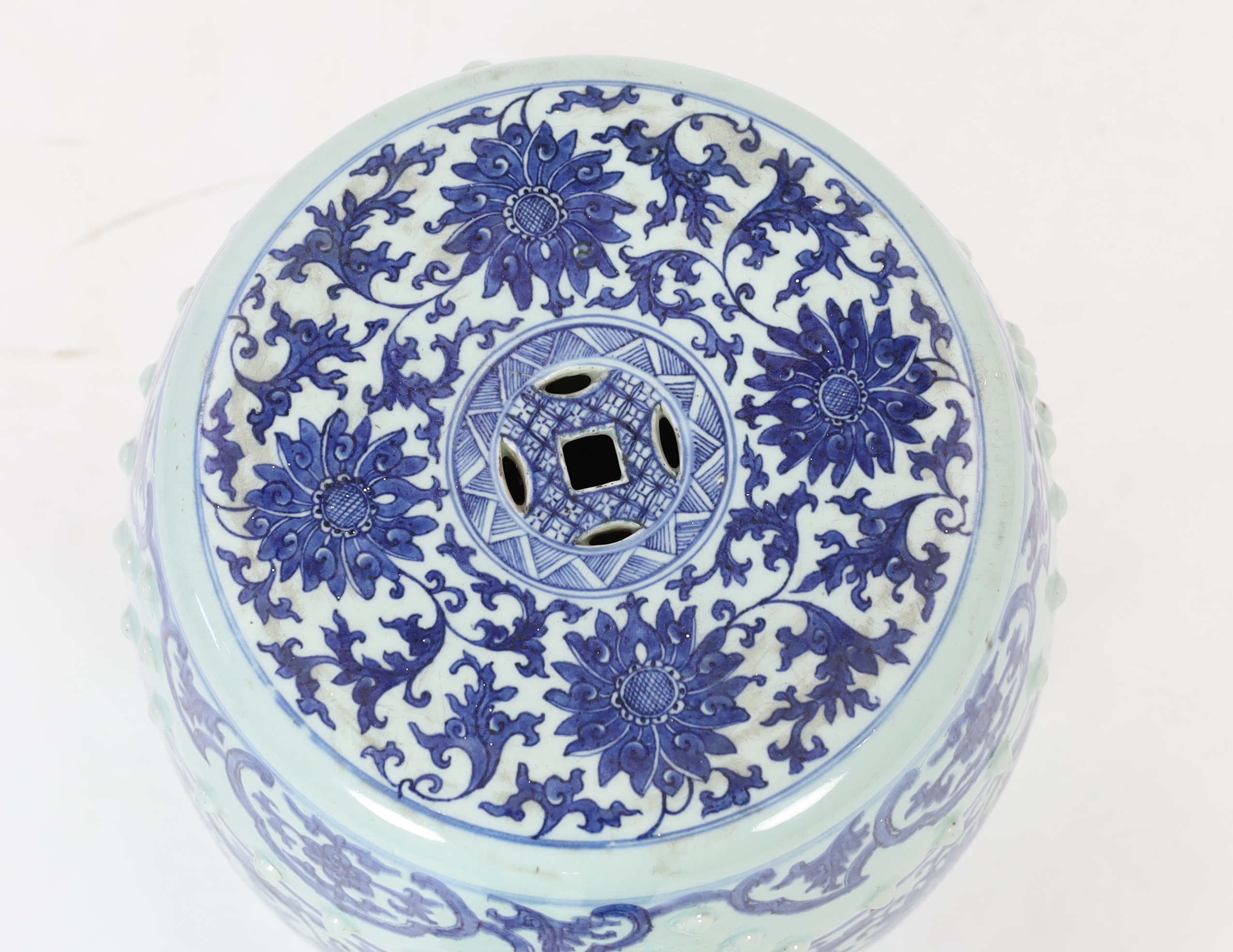 A Chinese blue and white porcelain stool, 19th century, painted with lotus flowers and scrolling - Image 3 of 5