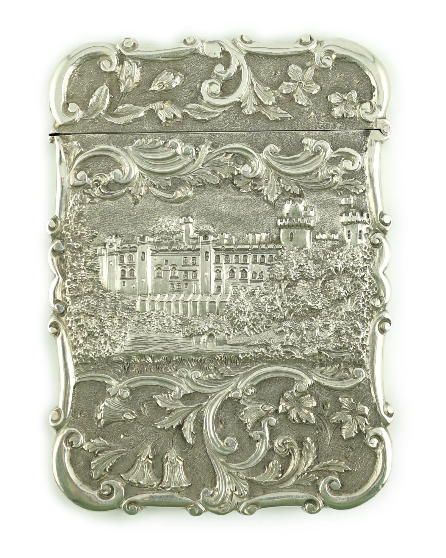 An early Victorian silver 'castle top' card case by Nathaniel Mills, embossed with scenes of Windsor