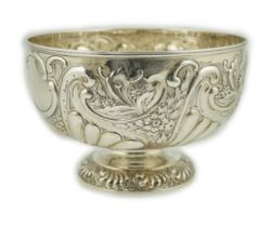 A late Victorian repousse silver rose bowl, by William Hutton & Sons, decorated with foliage and