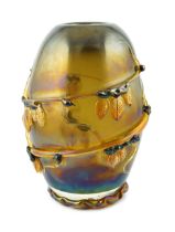 ** A Murano amber glass ovoid shaped vase, entwined with leaves, signed, 37cm highPlease note