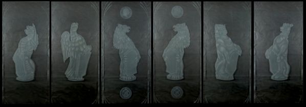 A set of six large cut and etched glass door panels each engraved with heraldic beasts, two with