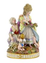 A Meissen group ‘The Broken Eggs’, late 19th century, after Acier, underglaze blue crossed swords