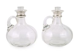 A pair of Edwardian silver mounted glass decanters, with stoppers etched 'Whisky' & 'Brandy', by