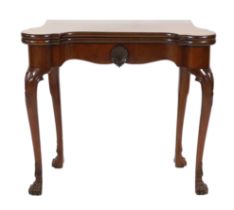 A George II mahogany serpentine folding top tea table, with folding top, scallop shell frieze and