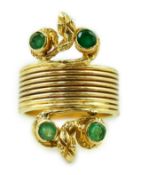 A Ilias Lalaounis 18k gold and four stone emerald set dress ring, of coiled design with twin serpent