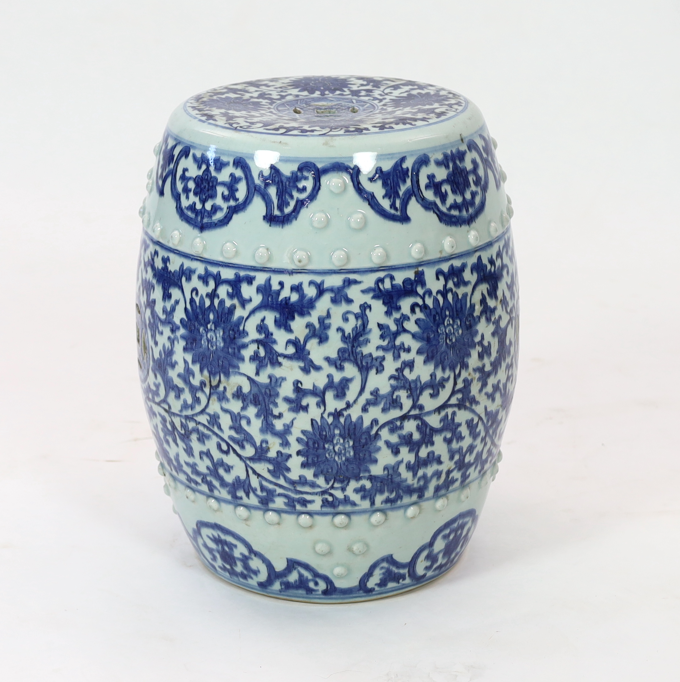 A Chinese blue and white porcelain stool, 19th century, painted with lotus flowers and scrolling - Image 2 of 5