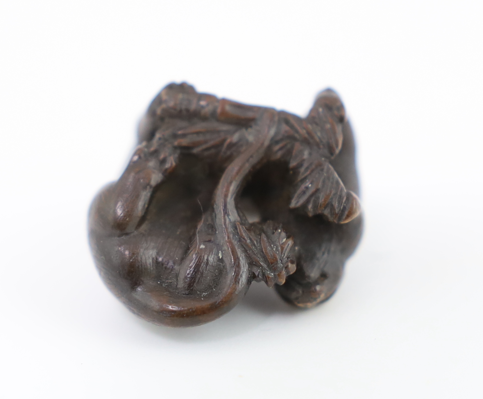 * A Japanese carved wood netsuke of a tiger and cub, 19th century, unsigned, 2.2cmProvenance: J. - Image 5 of 5