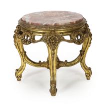 * A Queen Mary giltwood and composition low stand, early 20th century, 56cm diameter, 53cm