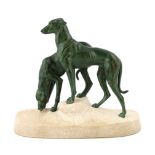 Masson, a French Art Deco bronze and composition stone group of two hounds watering, signed in the